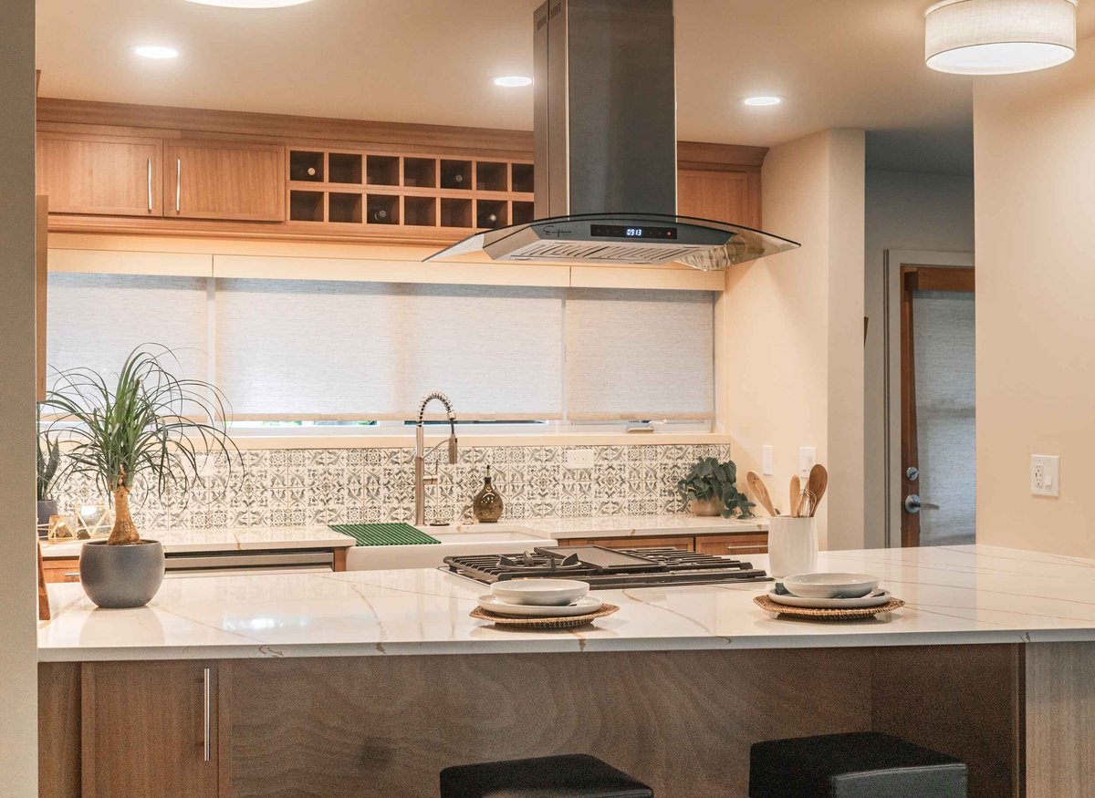 Mid-Century Kitchen Remodel with angled Countertop and bar seating